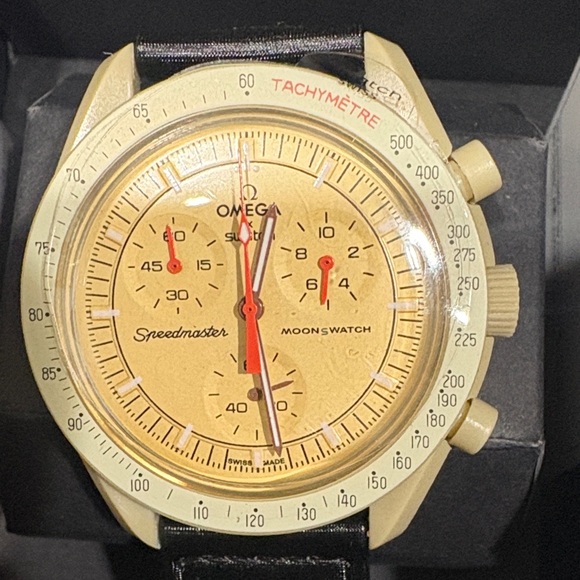 Omega Speedmaster Moonswatch with Gold Dial